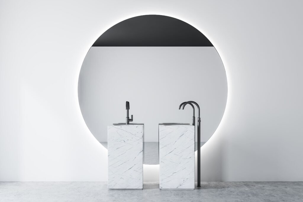 Covering salle de bain effet marbre – vasques modernes et miroir rond rétroéclairé en Wallonie
